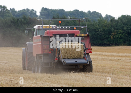 Fendt Tractor Baling With Massey Ferguson Baler Stock Photo - Alamy