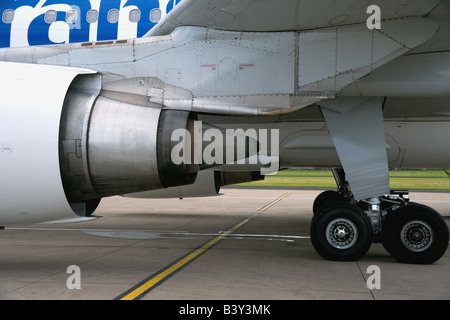 Closeup of an Airbus A310-300 airplane's engine and landing gear. Stock Photo