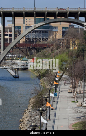 The Neyland Greenway winds along Fort Loudon Lake in downtown Knoxville, Tn. with Tennessee's Neyland Stadium in the background. Stock Photo