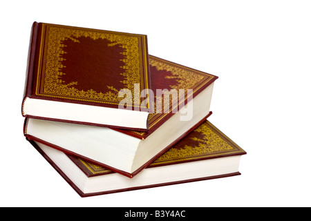Old leather bound decorative books isolated on a white background Stock Photo