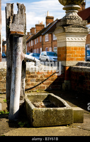 Old village pump in Lloyds the stonemasons at Great Bedwyn,Wiltshire,England,Great Britain,UK Stock Photo