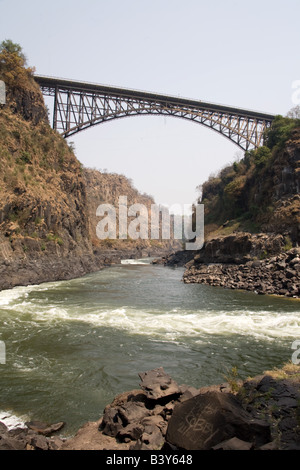 The Zambezi Bridge spanning between Zambia and Zimbabwe above the boiling pot just below the Victoria Falls. Stock Photo