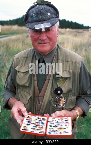 Scotland, Caithness, Ackergill Tower. Jimmy Sutherland the Ackergill ghillie with a box of salmon flies Stock Photo