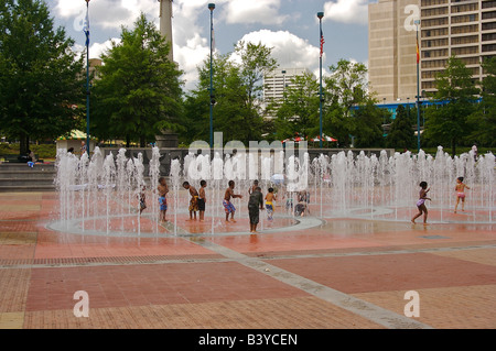 North America, USA, Georgia, Atlanta.  Children play in The Fountain of Rings at Centennial Olympic Park Stock Photo