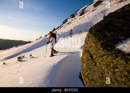 A man snowshoes in Tuckerman Ravine in New Hampshire's White Mountains. (MR) Stock Photo