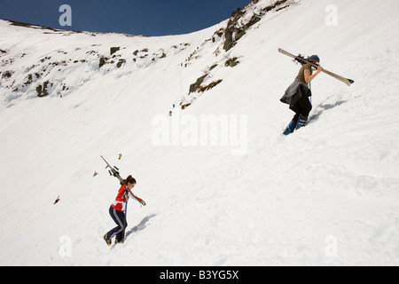 Skiers climbing Tuckerman Ravine in New Hampshire's White Mountains. White Mountain National Forest. April. Stock Photo