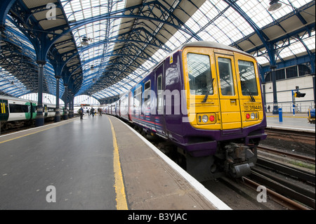 Class 319 train in first capital connect livery waiting at a platform at brighton railway station east sussex uk Stock Photo