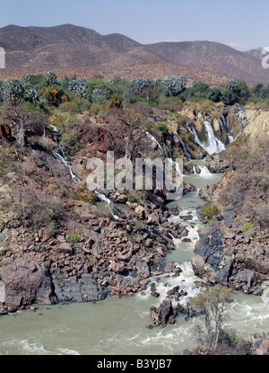 Namibia, Kaokoveld, Epupa Falls. The attractive Epupa Falls in rugged northwest Namibia are a series of parallel channels where