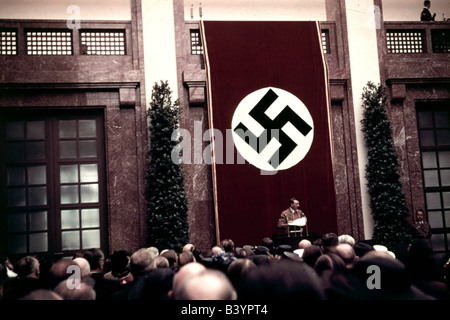 Hitler, Adolf, 20.4.1889 - 30.4.1945, German politician (NSDAP), Chancellor 30.1.1933 - 30.4.1945, speech during opening of Haus der Kunst, Munich 16.10.1938, flag, swastika, Nazi Germany, Third Reich, national socialism, nazi, 20th century, , Stock Photo