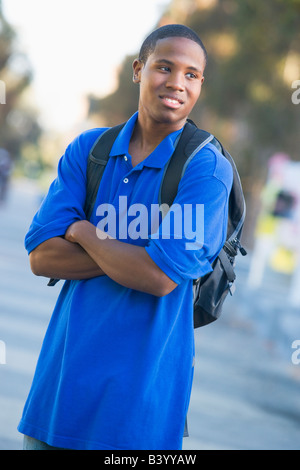 Man standing outdoors looking at something (selective focus) Stock Photo