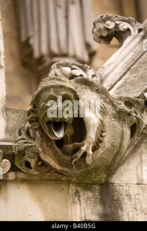 A cheeky looking Gargoyle on the North Transcept of London's Westminster Abbey. Stock Photo