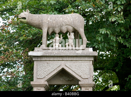 A roadside monument near Wells Somerset UK showing Romulus and Remus being suckled by the she-wolf Stock Photo