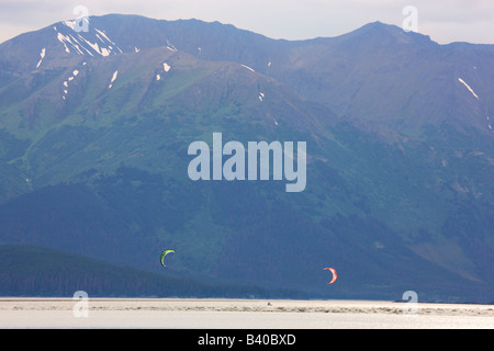 Troy and Mark kiteboarding the Bore Tide on Turnagain Arm near Anchorage Alaska Stock Photo