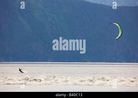 Troy kiteboarding the Bore Tide on Turnagain Arm near Anchorage Alaska Stock Photo
