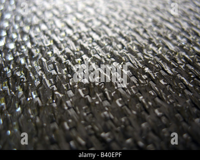 Real carbon fiber in its raw form very shallow depth of field Stock Photo