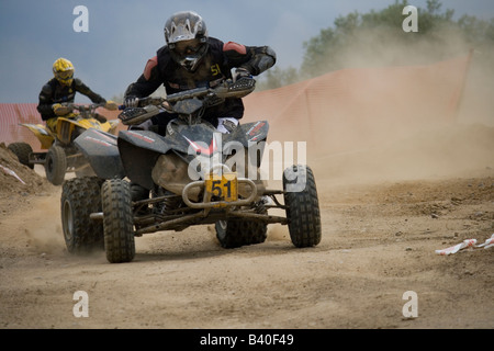 Quad riders during the cross country race. Stock Photo