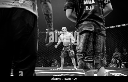 Cage Fighter in action during a Cage Wars competition held at Brahead arena in Glasgow MMA Fighters Mixed Martial Arts fighters Stock Photo