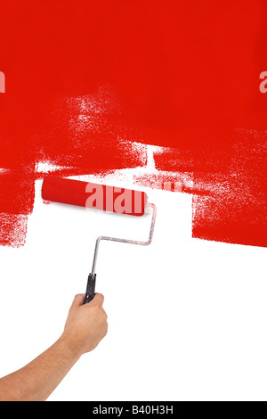 Painting red with paint roller cut out isolated on white background Stock Photo