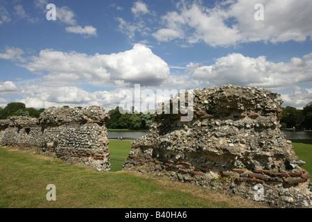 City of St Albans, England. The remains of the Roman wall at Verulamium Park with the park lake in the background. Stock Photo