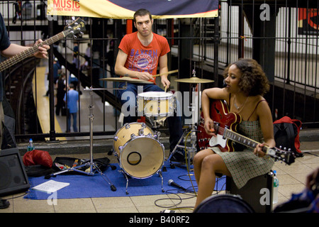 Susan Cagle and group are MUNY performers in the subway and train stations contributing to the music culture of New York City Stock Photo