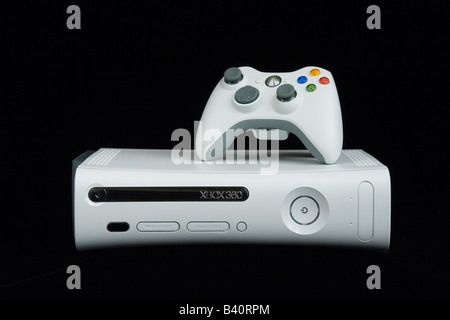 XBOX 360, video game controller by Microsoft on a black background. Stock Photo
