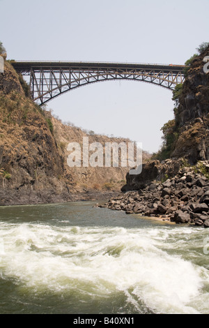 The Zambezi Bridge spanning between Zambia and Zimbabwe above the boiling pot just below the Victoria Falls. Stock Photo