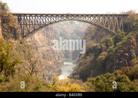 The Zambezi Bridge spanning between Zambia and Zimbabwe above the boiling pot just below the Victoria Falls. Stock Photo