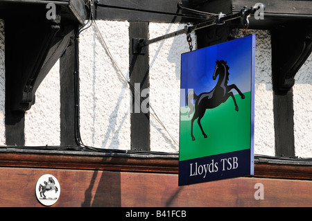 Swinging Lloyds TSB bank sign ancient timbered framed building Stock Photo
