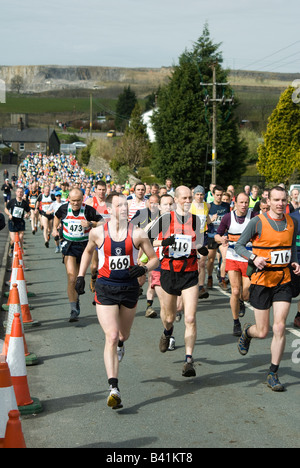People competing in the three peaks long distance race challenge in Yorkshire England Stock Photo