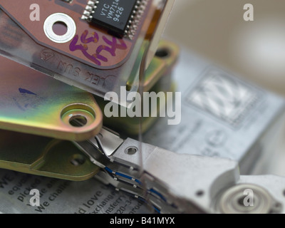 Hard disc drive electronics and head all meshed together, without any order. Stock Photo