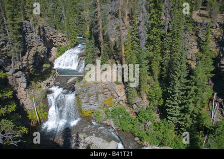 A double waterfall along the North Fork Trail near Tumalo Falls in the lower Cascade Mountains near Bend Oregon Stock Photo