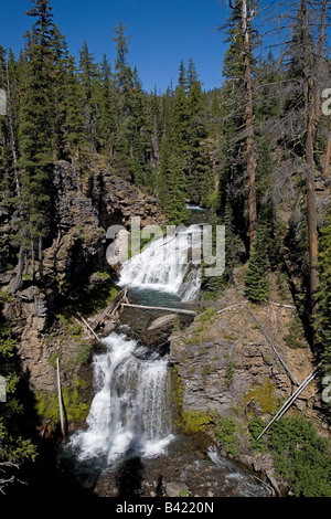 A double waterfall along the North Fork Trail near Tumalo Falls in the lower Cascade Mountains near Bend Oregon Stock Photo