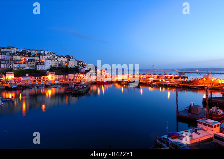 The small fishing town of Brixham on the South Devon coast just before sunrise whilst the sky is still dark Stock Photo