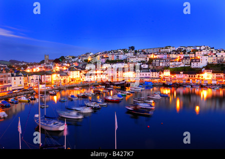 The small fishing town of Brixham on the South Devon coast just before sunrise whilst the sky is still dark Stock Photo