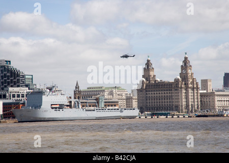 Royal Navy Lynx Helicopter flying over Liverpool and the RFA Lyme Bay as part of the Tall ships Race parade Stock Photo