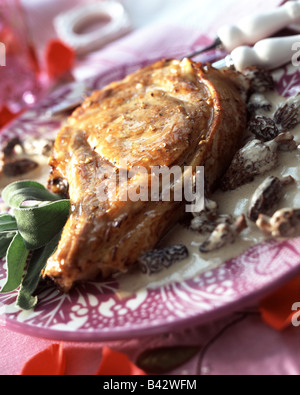 Veal chop with morels Stock Photo