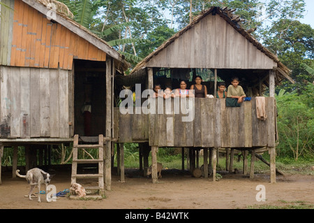 A Brazilian family pose for the camera at their home in a small village by the Madeira River. Stock Photo