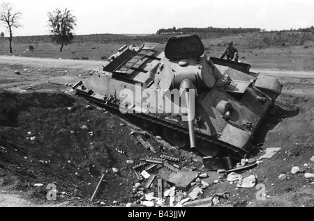 A German tank knocked out by Soviet tank men in the village of ...