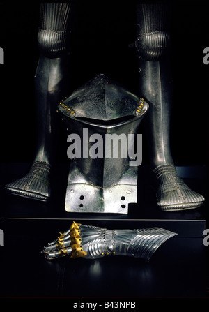 weapons / arms, defensive arms, armour, jousting helmet, Germany, circa 1500, behind it leg armour, late 15th century, in front of it fingered glove, steel with brass, Southern German, circa 1480, Bavarian National Museum, Munich, historic, historical, Middle Ages, knight's armour, joust, tournament, visor, handcraft, craft, medieval, Stock Photo