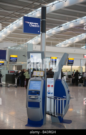 Heathrow London England UK Heathrow Airport international departures check-in kiosk for British Airways in Terminal 5 Stock Photo