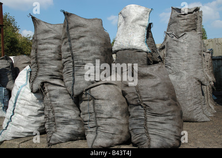 Coal bags awaiting delivery Stock Photo