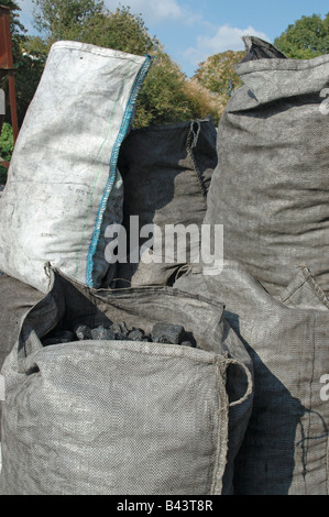 Coal bags awaiting delivery Stock Photo