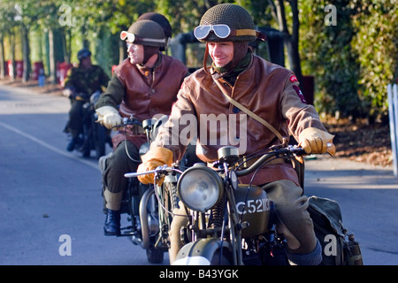 Motorcycle bike riders dressed as war time military dispatch riders of the period at the Goodwood Revival West Sussex UK 2008 Stock Photo