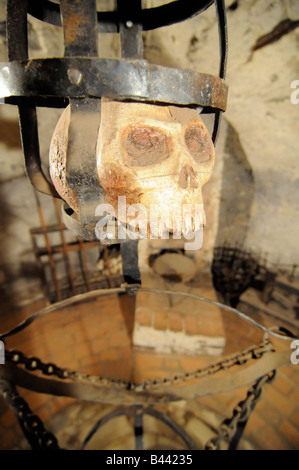 A skull on display in the torture room and dungeon in the Dalibor Tower, in the Prague Castle compound, in Czech Republic. Stock Photo