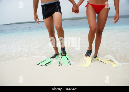 South American couple wearing flippers Stock Photo