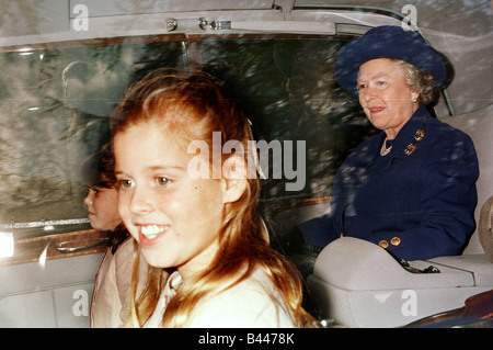 Queen Elizabeth accompanied by the Duke of Edinburgh Princess Beatrice and Princess Eugenie arriving at Crathie Church Stock Photo