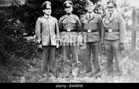 World War Two German prisoners of war two of whom are brothers and another their father Stock Photo