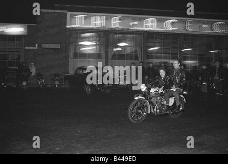 January 1961 Motorbikes and riders gather at the famous Ace Cafe at Stonebridge Park on the North Circular Road in London Stock Photo