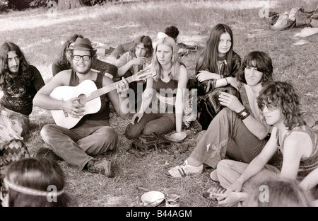 Hippy Festival Windsor Great Park August 1972 Groups of hippies from all over the world camping in the open sheltered by big oak trees and cooking in the bushes Local Caption relaxedimages Stock Photo