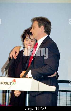 1997 General Election Labour Victory party Tony Blair and Cherie Blair on stage holding each other May 1997 Stock Photo
